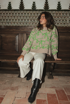 Luxury chunky knit Eden Jumper in oatmeal merino wool featuring playful lime green alpaca pattern