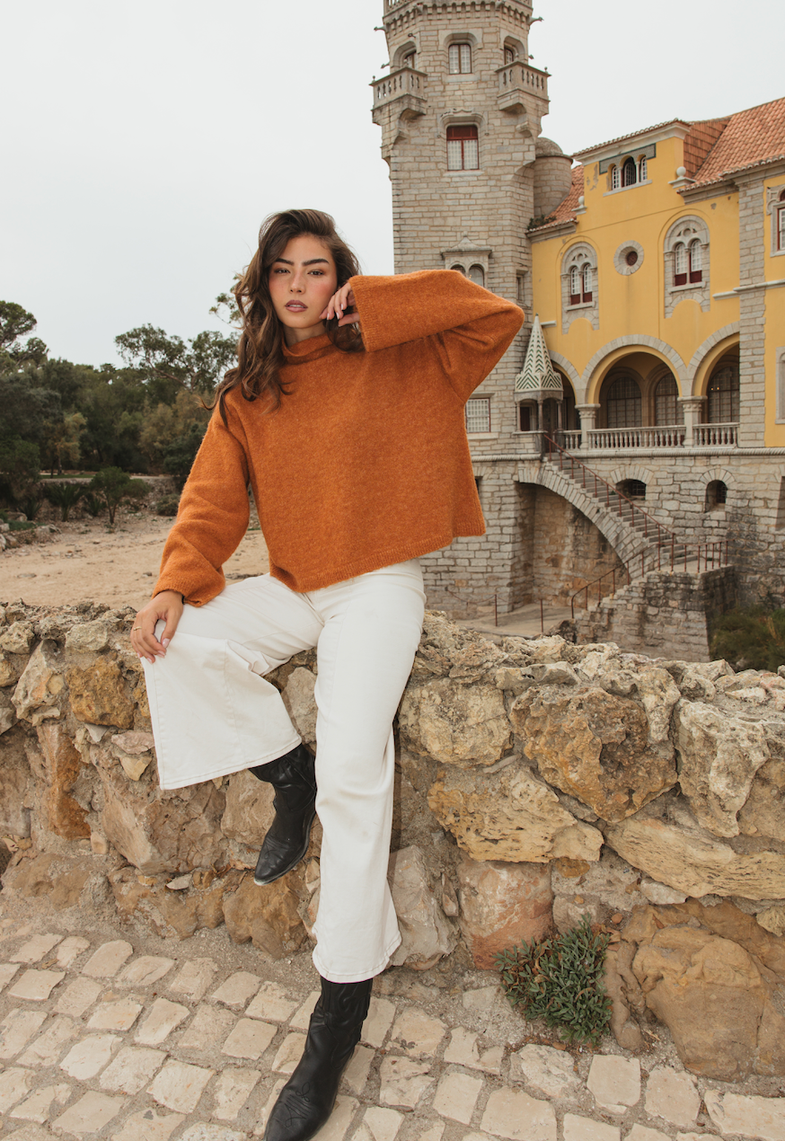 Cropped boxy knitted jumper in saffron made from bouclé wool and alpaca blend