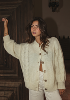 Buttercream mohair cable knit cardigan with oversized fit and coconut shell buttons