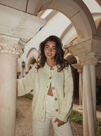Buttercream mohair cable knit cardigan with oversized fit and coconut shell buttons