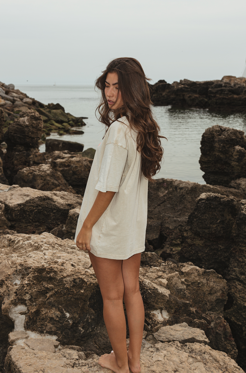 Cowgirl Club T-shirt in off-white organic cotton with orange embroidered logo and oversized fit