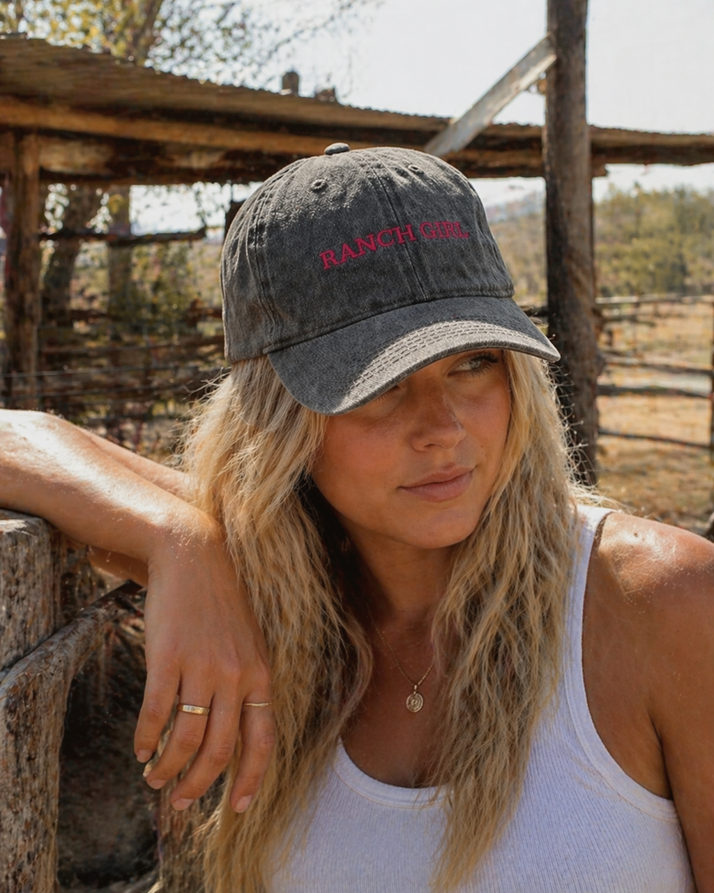 Western cowgirl baseball cap in acid wash grey featuring Ranch Girl embroidery in raspberry thread