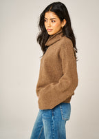 Close-up of Coco Brown Sienna Jumper bouclé alpaca and mohair texture