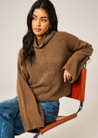 Close-up of Coco Brown Sienna Jumper bouclé alpaca and mohair texture