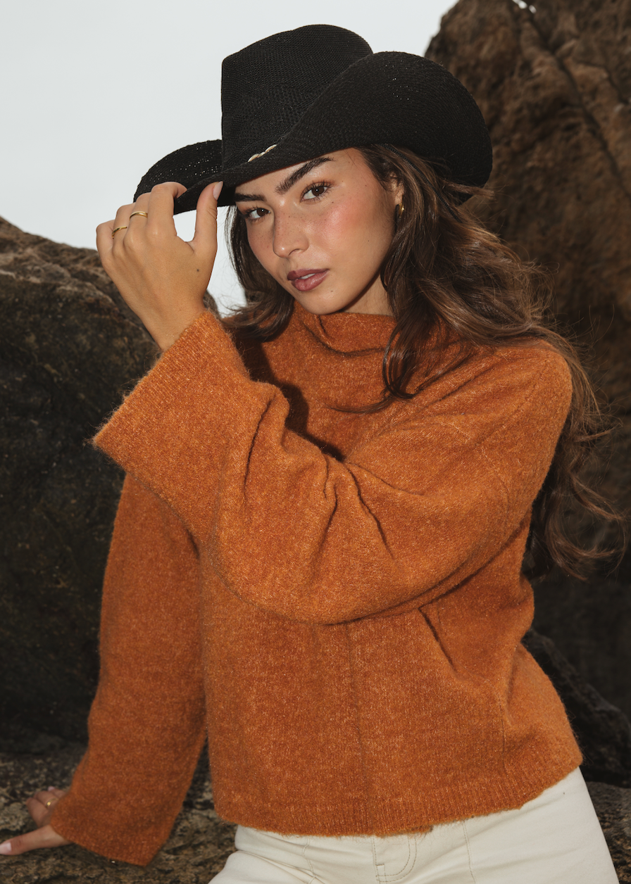 Cropped boxy knitted jumper in saffron made from bouclé wool and alpaca blend