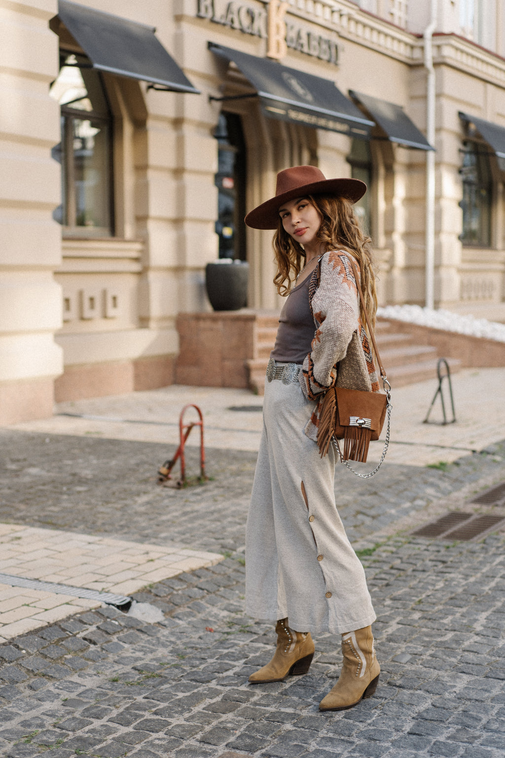 Aurora Pants side view showing coconut shell button slit detail boho festival 