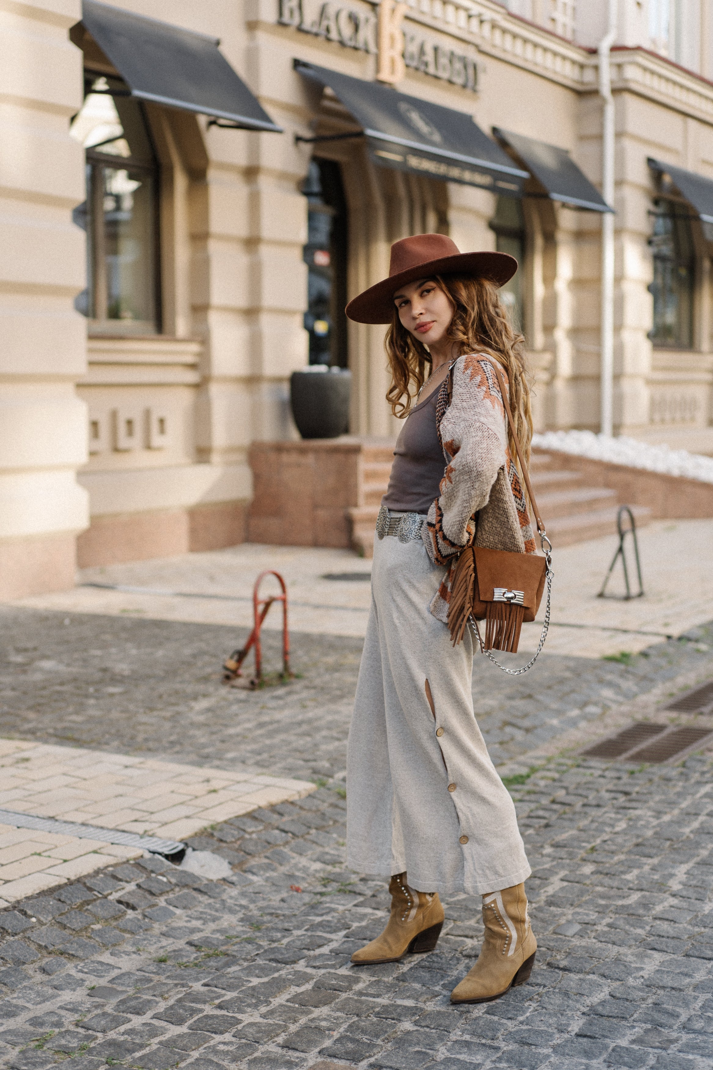 Aurora Pants side view showing coconut shell button slit detail boho festival 