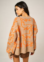 Handmade Eden Jumper in Dark Cookie super-chunky merino wool with bright orange alpaca jacquard motif